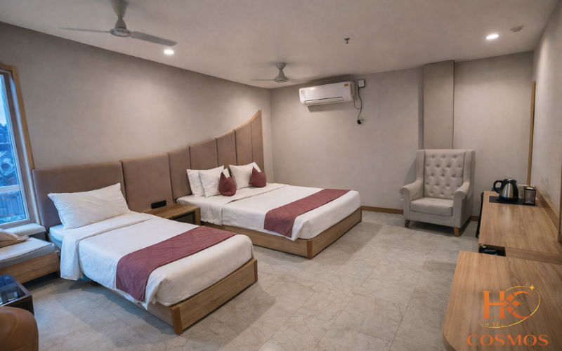 Comfortable budget hotel room at Hotel Cosmos in Laxmi Sagar Bhubaneswar